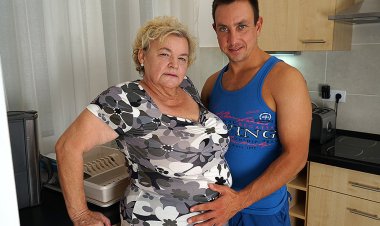 Curvy granny sucking and fucking a way younger dude in her kitchen