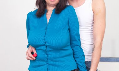 Chubby housewife playing with her toyboy