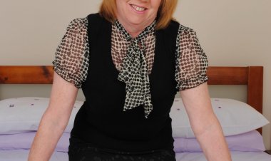 Naughty mature lady getting wet on her bed