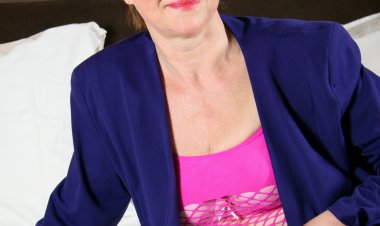 Naughty Dutch housewife playing with her toy