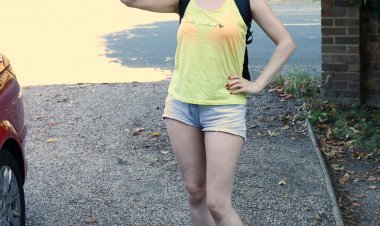 Hairy mature lady playing with the hose in the garden