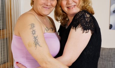 Two curby mature ladies getting wet and wild in the livingroom