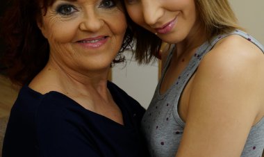 Horny old and young lesbian couple make out on the couch