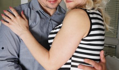 naughty mature lady playing with her toy boy