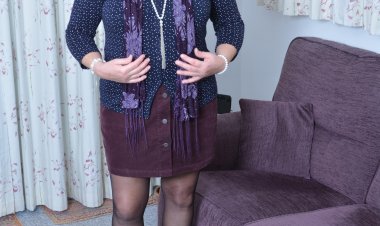 British mature lady playing on the couch