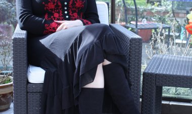 Big breasted British housewife getting wet