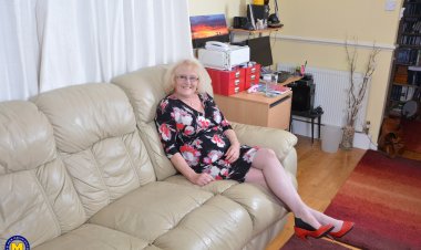 Naughty British mature lady getting wet on her couch