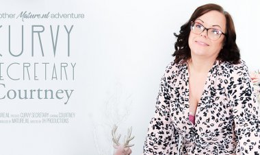 Curvy secretary Courtney loves playing with her shaved pussy