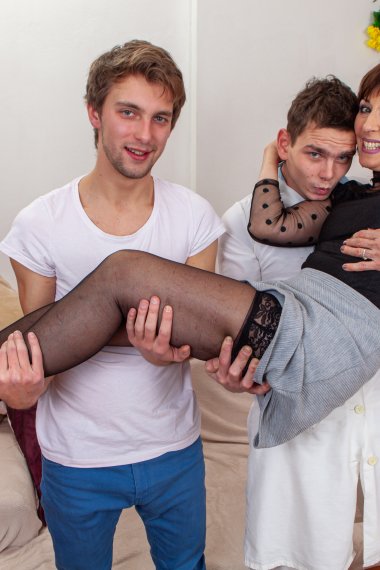 Mature slut taking on two younger cocks at once