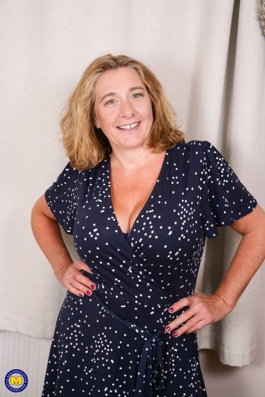 Naughty Camilla playing with her big natural tits