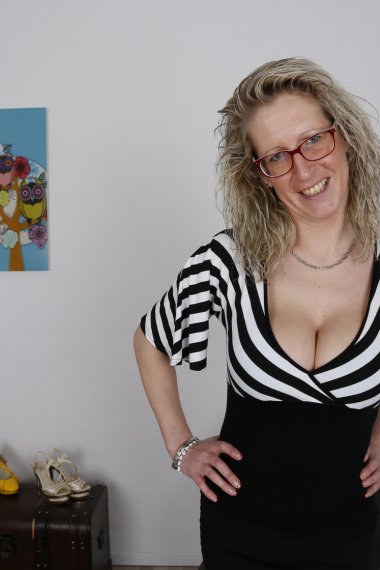 Naughty German housewife showing off her dirty mind