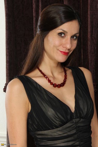 Cute American housewife playing with herself