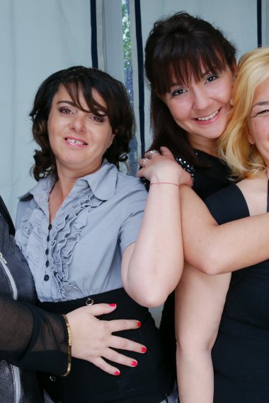 Four old and young lesbians having a party