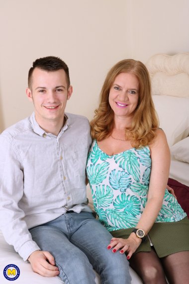 Big breasted British housewife having fun with her toy boy