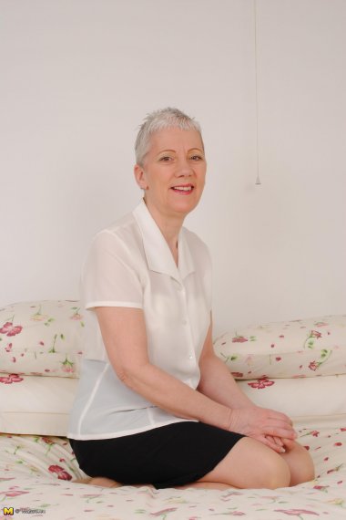 Horny mature slut stripping and teasing