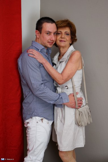 Naughty mature lady playing with her toy boy