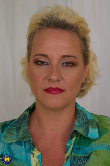 Big breasted mature lady having a date over to play with