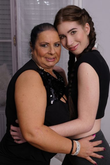 Big breasted curvy housewife doing a naughty lesbian teen