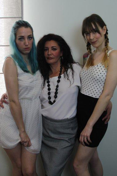 Three spanish old and young lesbians playing together