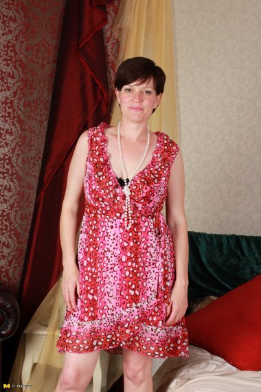 Horny housewife fucking in her bed