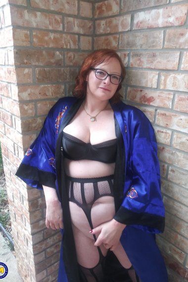 Naughty American mature lady playing with her wet pussy