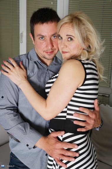 naughty mature lady playing with her toy boy