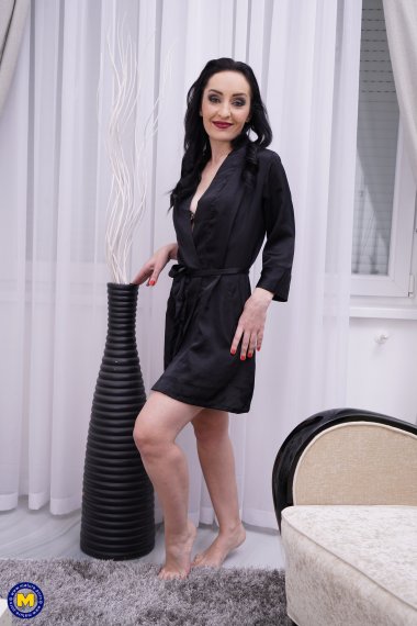 Hot and horny housewife playing with herself on the couch